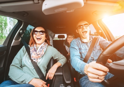 Singing family in car